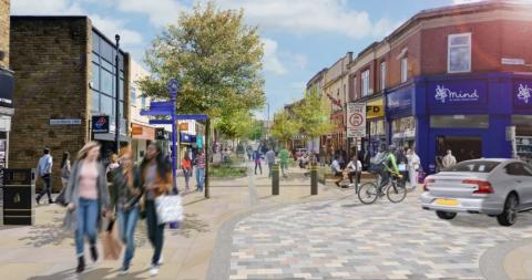 Commercial Street shown here free of traffic, with wide pavements and places to sit. 