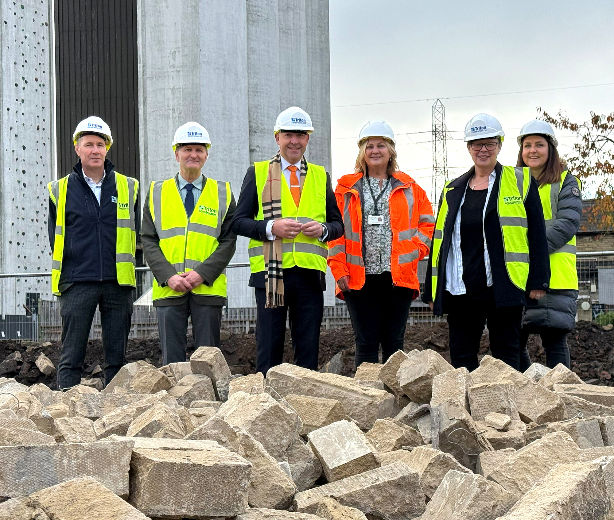 On Site photo, left to right: Ian Chapman, Tritan Construction Director; David Whitehead and Cllr Howard Blagbrough, Co-Chairs of Brighouse Town Deal Board; Janet Whitlow, Calderdale Council Programme Lead; Cllr Sarah Courtney, Calderdale Cabinet Member for Regeneration and Transport; Emma Martin, Calderdale Council Project Manager.