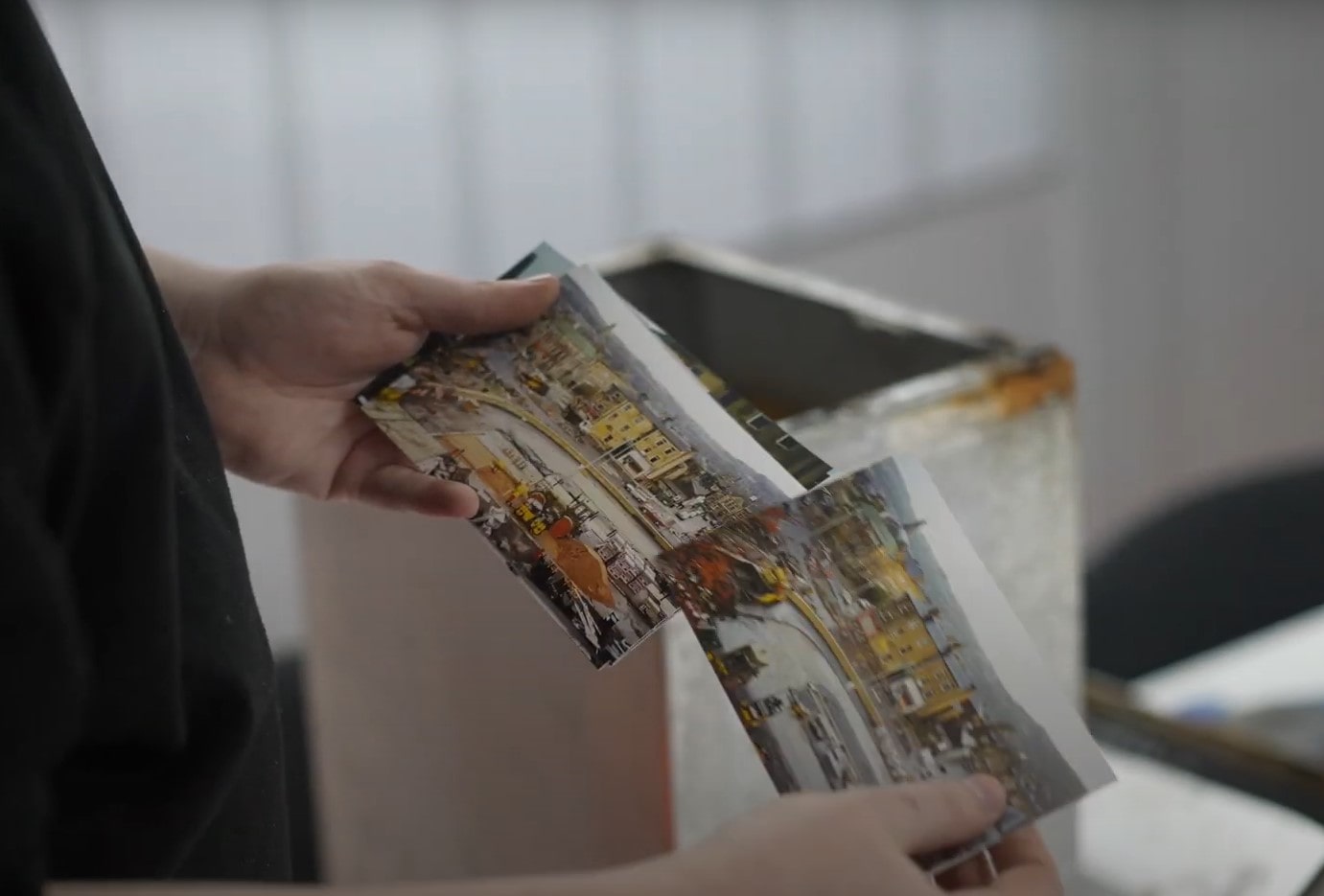 Thumbing through some of the photos from inside the time capsule.