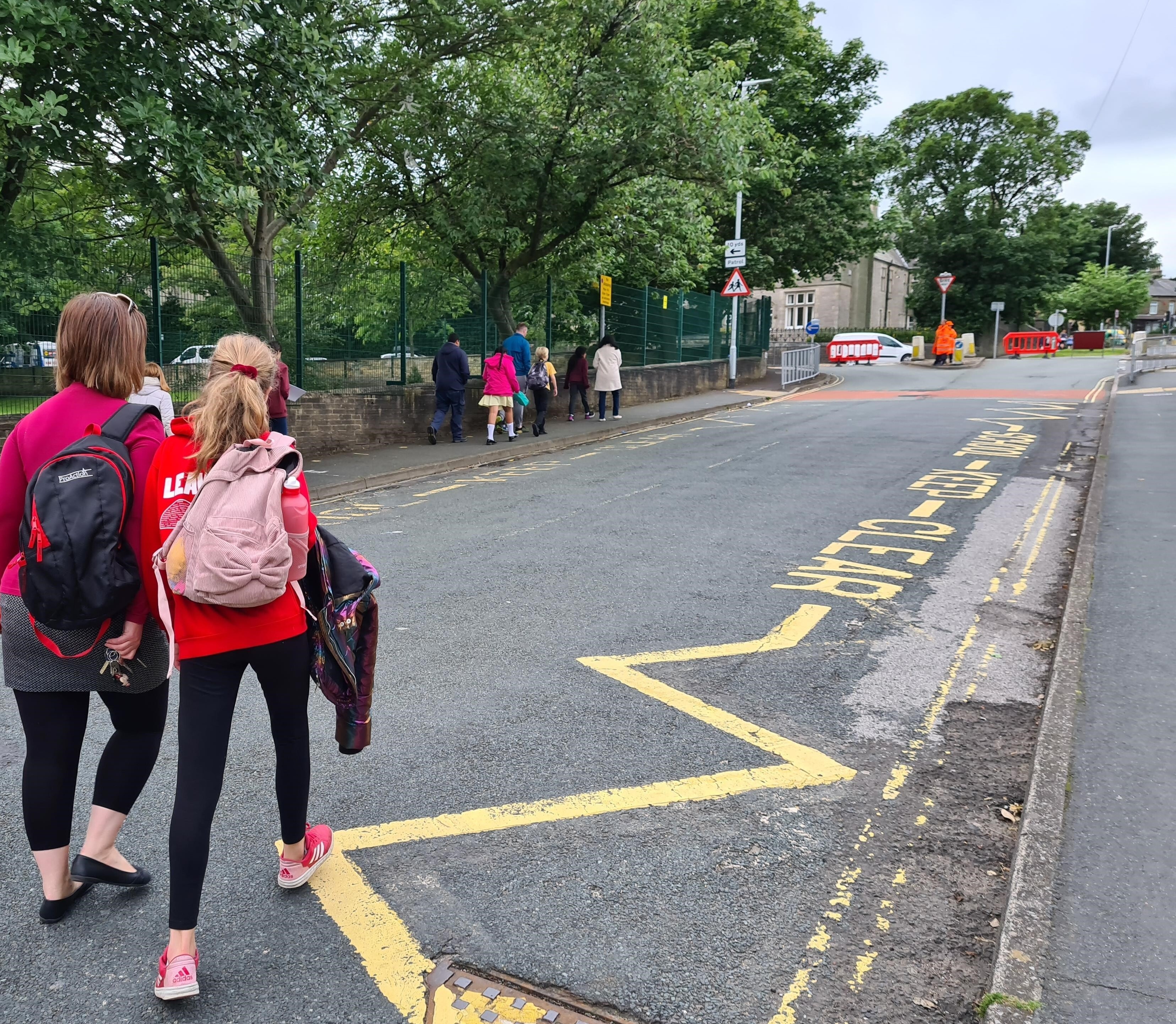 People walking on a designated school streets at Saint Mary's, Halifax.