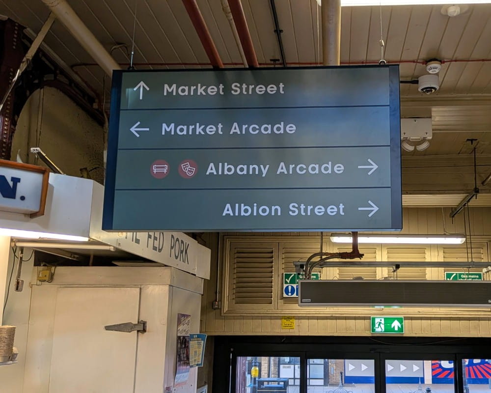 New signs with directions to locations around the market.